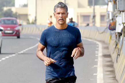'Ironman' Milind Soman running barefoot from Ahmedabad to Mumbai