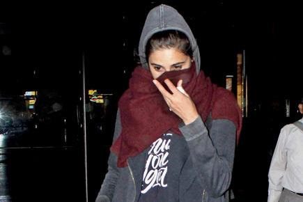 What is Nargis Fakhri trying to hide?
