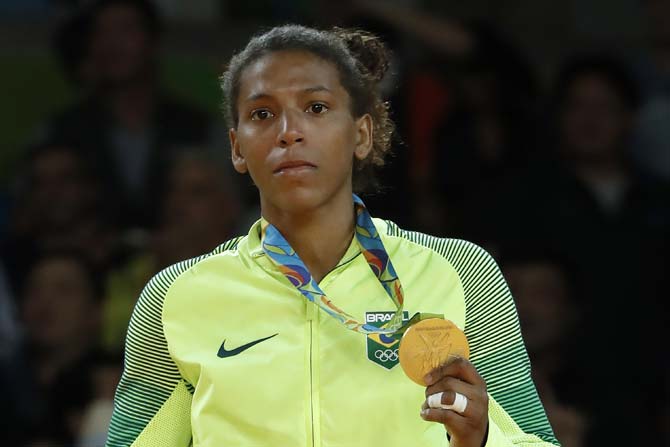 Brazilian judo fighter Rafaela Silva shows her Olympic gold medal