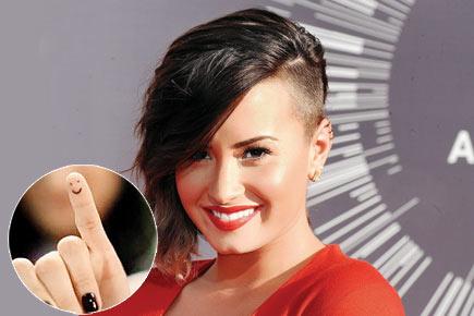 Singer Demi Lovato gets inked