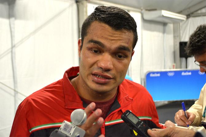 Vikas Krishan Yadav talking to reporters after winning his bout against Charles Conwell of the US in the men