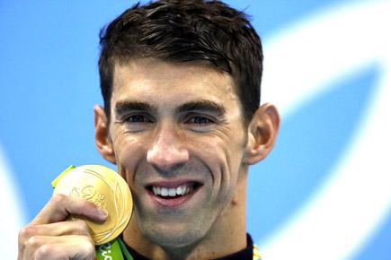 Rio 2016: Michael Phelps wins 2 gold in 15 minutes, takes record tally to 21