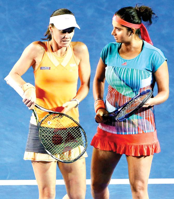 Martina Hingis (left) and Sania Mirza during the 2016 Australian Open final at Melbourne Park, Australia recently. Pic/Getty Images