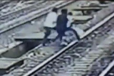 Watch video: Passengers save woman attempting suicide at Mumbai station