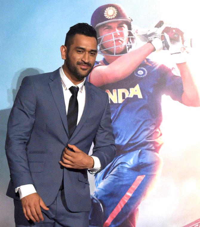 Cricketer MS Dhoni pose for media during the trailer launch of film 
