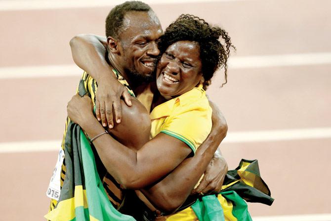 Usain Bolt with mother Jennifer