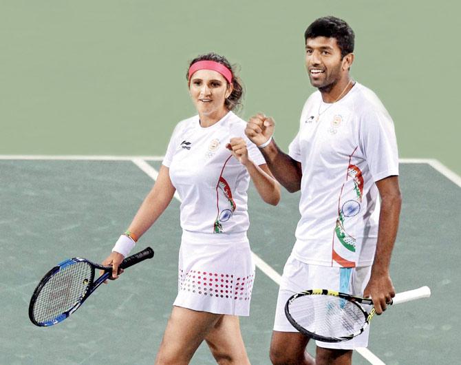 India’s Sania Mirza and Rohan Bopanna are ecstatic at Rio on Friday. Pic/PTI