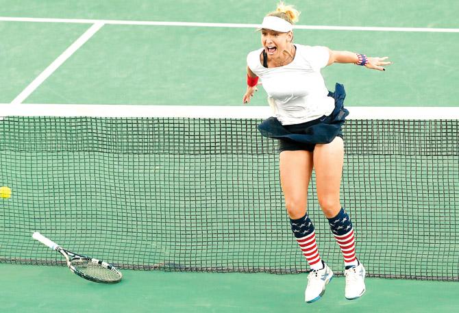 Bethanie Mattek-Sands celebrates victory in the mixed doubles gold medal match. Pic/Getty Images