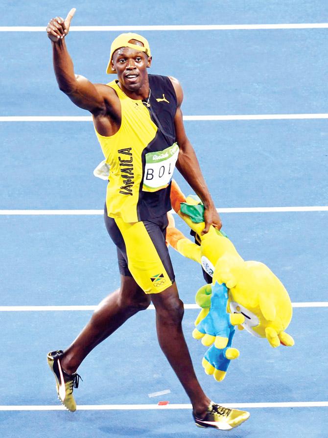 Jamaican Usain Bolt celebrates after winning gold in the 100m event at Rio de Janeiro on Sunday. Pic/AFP