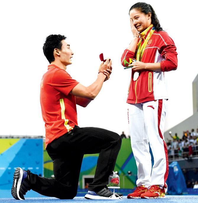 He Zi receives a marriage proposal after her event. Pic/AFP