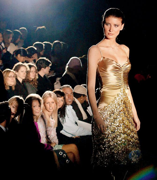 A model wears a bronze ombre sequin dress at the Badgley Mischka Fall Fashion Show in New York. PIC/AFP 
