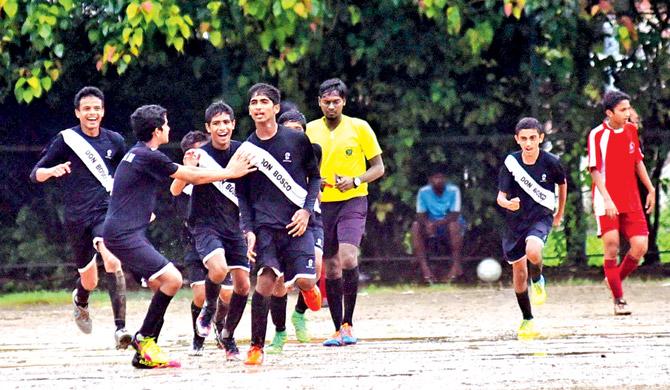 The Don Bosco team celebrate after scoring a goal against St Lawrence (Kandivli) in MSSA boys U-16 inter-school football tournament at Azad Maidan recently. Pic/Atul Kamble