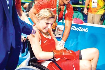 Rio 2016: Hurt Russian boxer wheelchaired