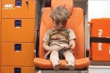 Haunting image of Syrian boy rescued from Aleppo rubble goes viral