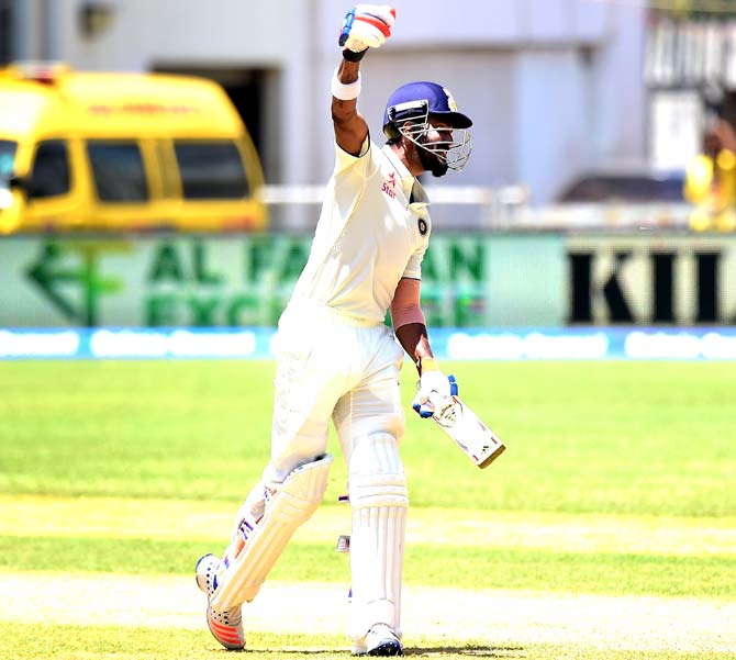 Lokesh Rahul of India celebrates after reaching a century with a Six off West Indies bowler Miguel Cummins on day 2 of the 2nd Test between India and the West Indies in Kingston, Jamaica. Pic/AFP