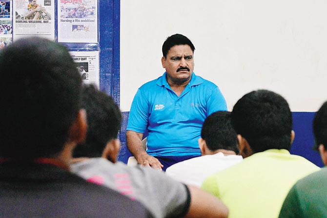 SAI wrestling coach GS Sangha with his trainees yesterday