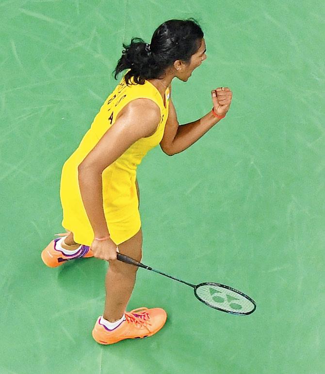 India’s PV Sindhu exults after winning the  first game against Carolina Marin of Spain in Rio yesterday. PICS/GETTY IMAGES