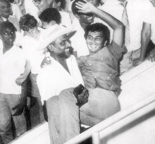 Sunil Gavaskar being lifted by Trinidadian cricket enthusiast Roodal Mahelal after the Indian opener’s double century at Queen