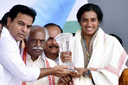 PV Sindhu receives Rs 5 crore cheque from Telangana CM