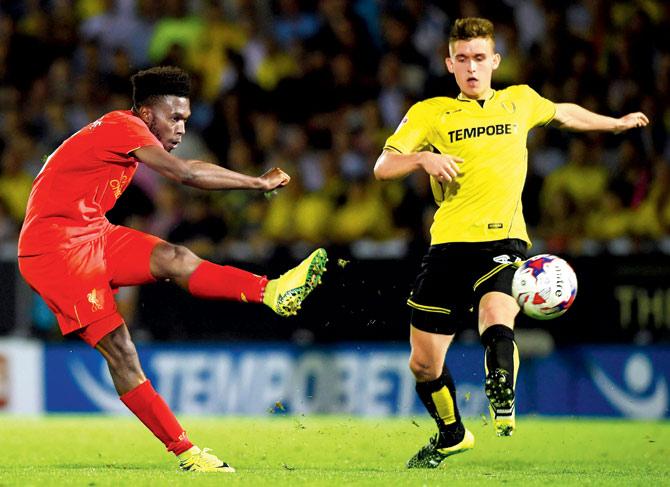 Liverpool striker Daniel Sturridge unleashes a left-footer against Burton Albion during their League Cup second round match at the Pirelli Stadium in Burton upon Trent, England, on Tuesday. Sturridge scored twice as Liverpool won 5-0. Pics/Getty Images 