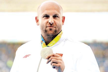 Polish Piotr Malachowski sells Rio 2016 silver to aid boy's cancer treatment