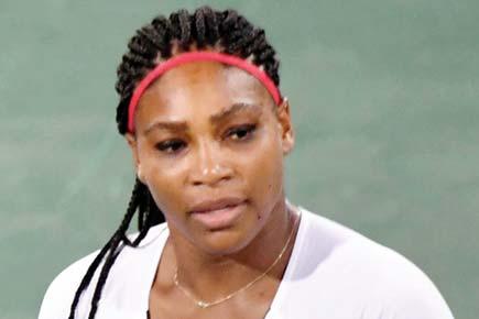 Serena Williams shoulders burden of history at Flushing Meadows