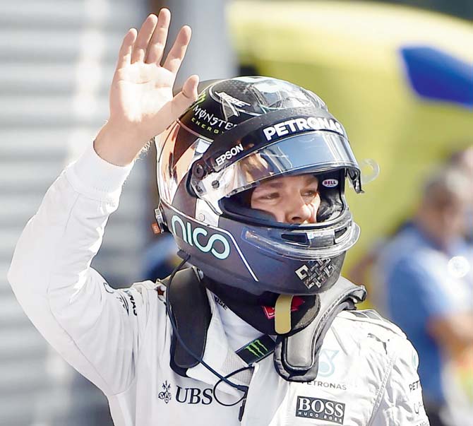 Mercedes F1 driver Nico Rosberg celebrates after winning pole position at the Spa-Francorchamps Circuit in Spain on Saturday during the qualifying session for today’s Belgian Grand Prix. PIC/AFP