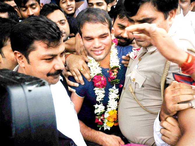 Wrestler Narsingh Yadav coming out of NADA office in New Delhi on Monday. Yadav was on Monday cleared of doping charges by the National Anti-Doping Agency (NADA), paving the way for him to compete in the Rio Olympics later this month. Pic/PTI