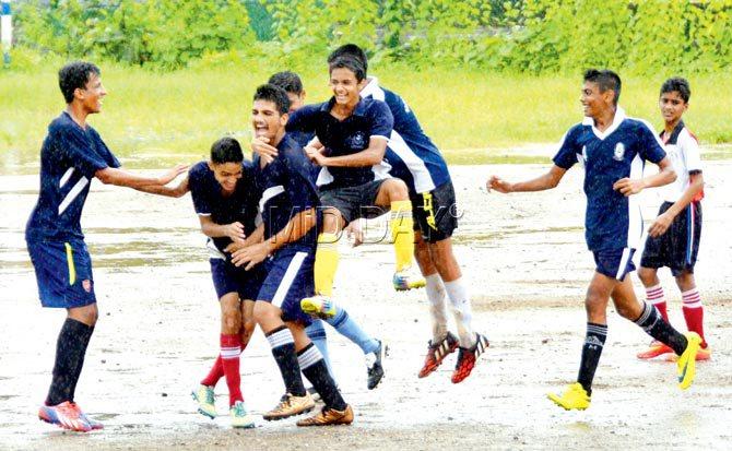 Navy Children (Colaba) players celebrate a goal en route to their 5-1 victory over St Mary