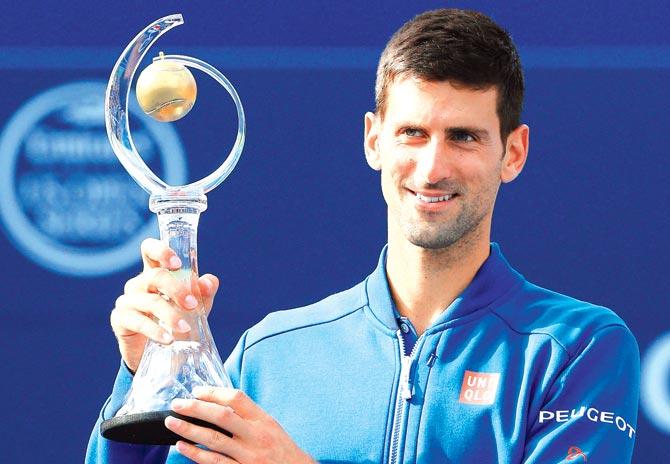 Novak Djokovic with his prize