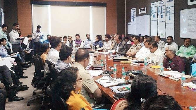 Chief Minister Devendra Fadnavis chairing a recent war room meeting with officials who directly oversee the city’s infrastructure projects. Pic/Courtesy CMO