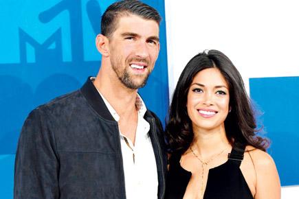 Michael Phelps partner Nicole Johnson missus in tow at MTV awards
