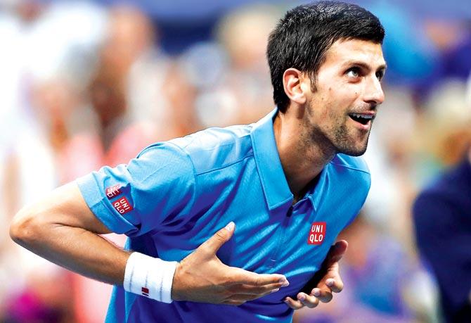 Novak Djokovic celebrates after defeating Jerzy Janowicz of Poland at the US Open on Monday. Pic/AFP