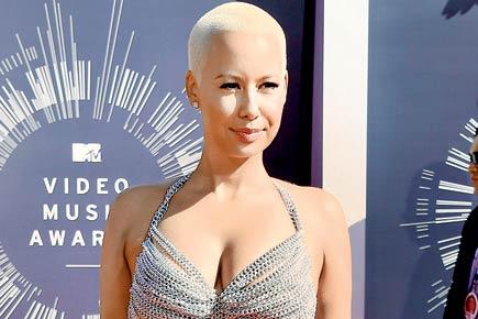 Amber Rose expecting second child with 21 Savage
