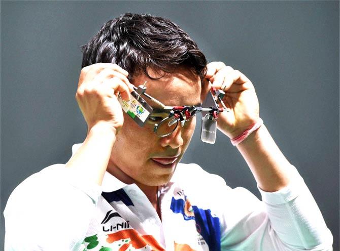 Shooter Jitu Rai reacts after losing in the finals of men