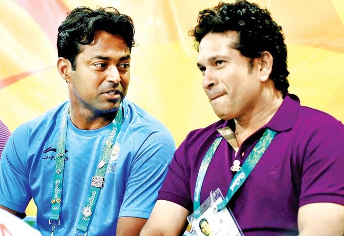 India tennis ace Leander Paes (left) chats with cricket legend Sachin Tendulkar in Rio de Janeiro on Saturday. Pic/PTI