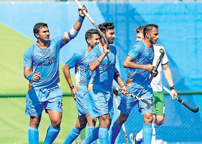 Jubilant Indian players celebrate after their 3-2 win over Ireland in their opening encounter at the Olympic Hockey Centre in Rio de Janeiro on Saturday. Pic/AFP
