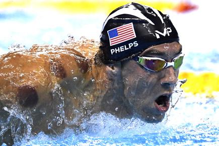 Revealed! The mystery of the purple dots on  Michael Phelps' back