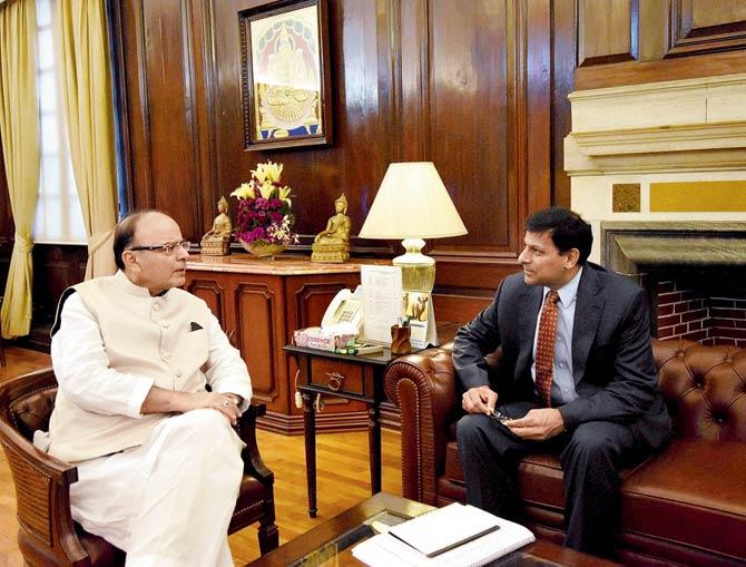 Finance Minister Arun Jaitley with RBI Governor Raghuram Rajan during the pre- policy discussion at North Block in New Delhi. Pic/PTI