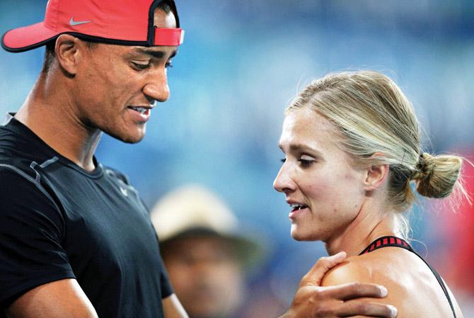 USA’s Ashton Eaton (left) with his wife Brianne Theisen during an athletics event at Rio recently. Pic/getty images