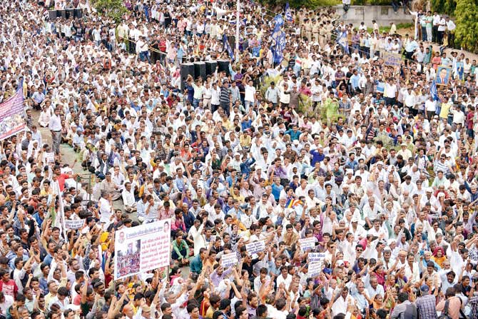 Dalits gather in protest in Ahmedabad on July 31. Thousands took a pledge not to skin cattle to protest the recent beating of Dalit youths by so-called Gau Rakshaks in Una. Pic/AFP
