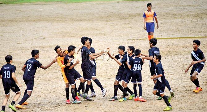 Don Bosco (Matunga) players celebrate after their 1-0 win over  St Francis D’Assisi (Borivili) in the MSSA boys’ U-16 Div I encounter  at St Xavier’s ground in Parel on Saturday. Pic/Atul Kamble