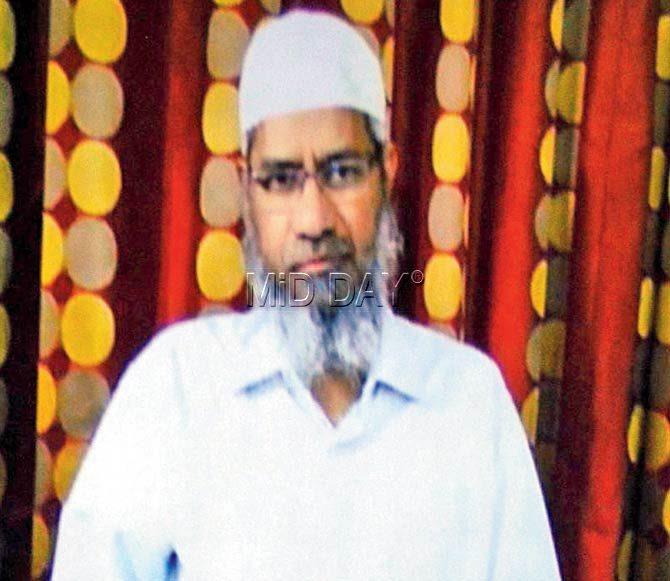 Dr Zakir Naik addressed the media through Skype in July, after the government launched a probe against him. He is currently in Gambia, Africa. Pic/Datta Kumbhar