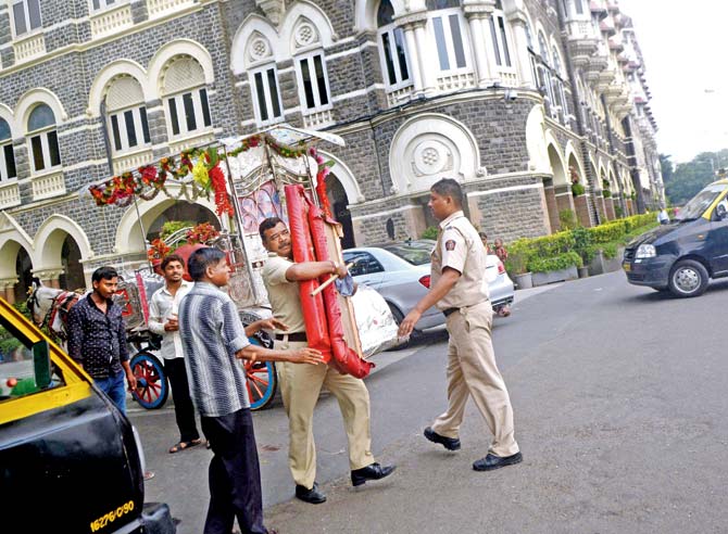 Police taking action on a horsecart at Colaba. File pic