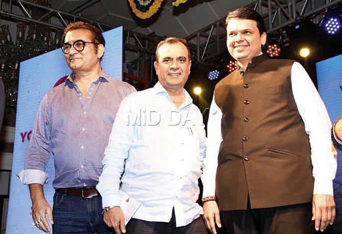 Mr Yogesh Lakhani seen with CM Devendra Fadnavis and singer Abhijeet at the Music Launch of Marathi film Kanha. 