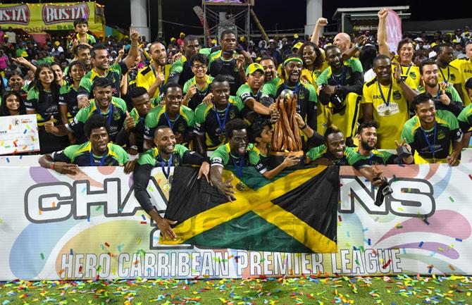 Jamaica Tallawahs team with the Caribbean Premier League trophy 