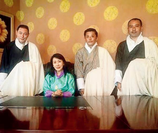 Kelly Dorji being inducted in to the foundation by Her Majesty Gyalyum Dorji Wangmo Wangchuck