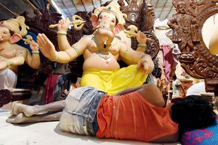 Rest away! When a worker fell asleep at Lord Ganesha's feet