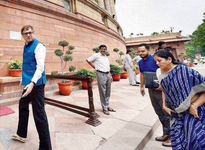 Minister of Commerce & Industry, Nirmala Sitharaman and TMC leader Derek O’Brien arrive at Parliament house during the monsoon session in New Delhi on Friday. Pics/PTI