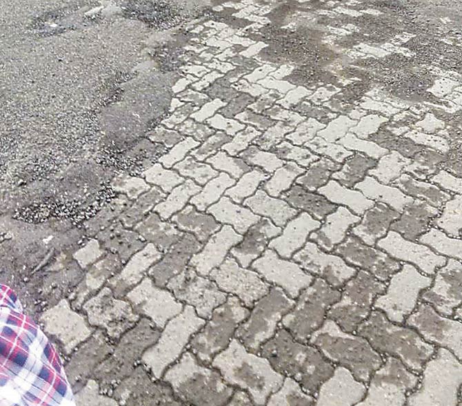 Authorities have plugged the potholes with paver blocks at Santacruz